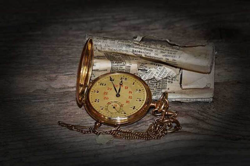 Old Clock and newspaper
